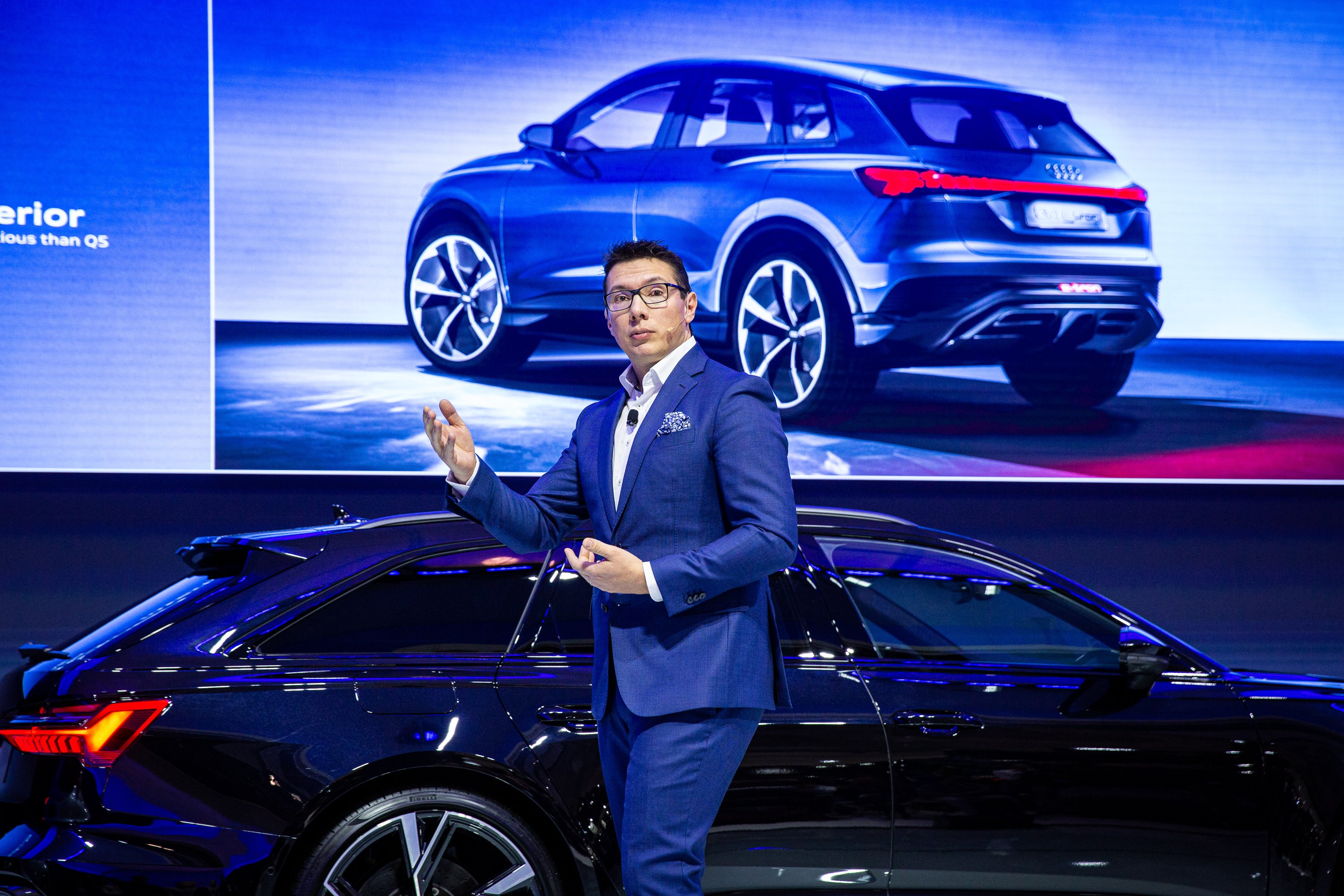 Audi president Giorgio Delucchi in front of RS 6 Avant